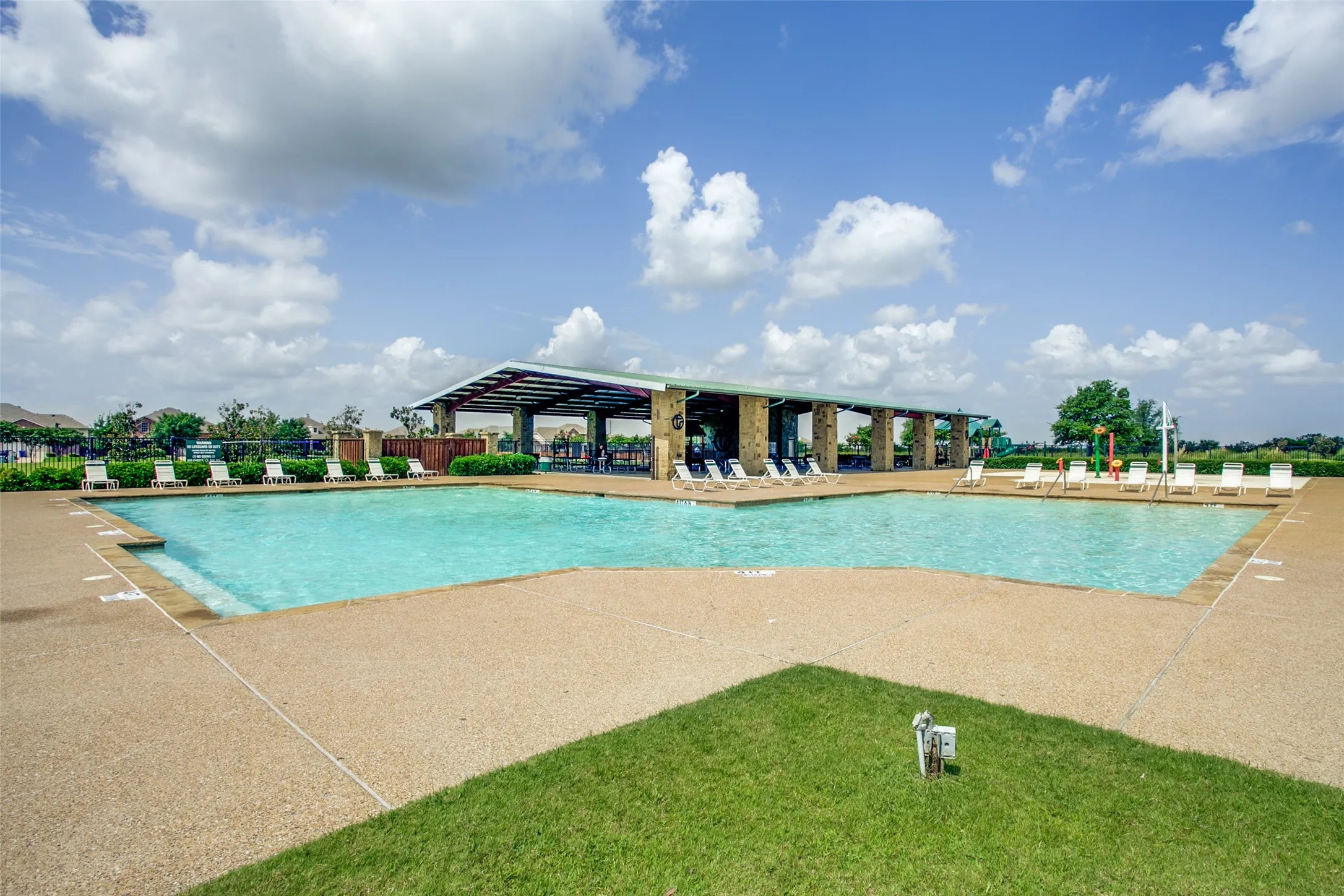 Community features large pool, playground, splash park and trails.