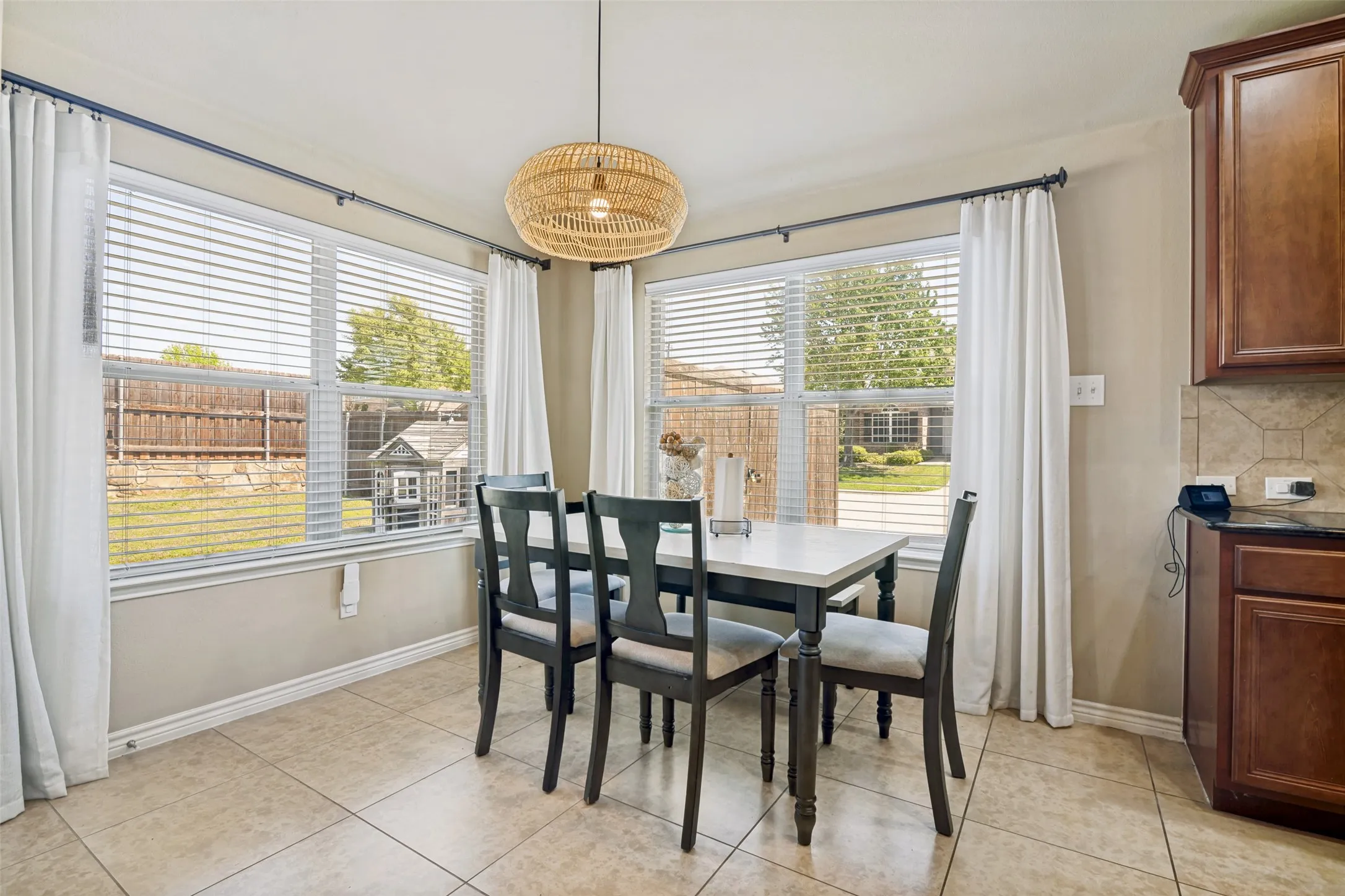 Dining area is bright and spacious.