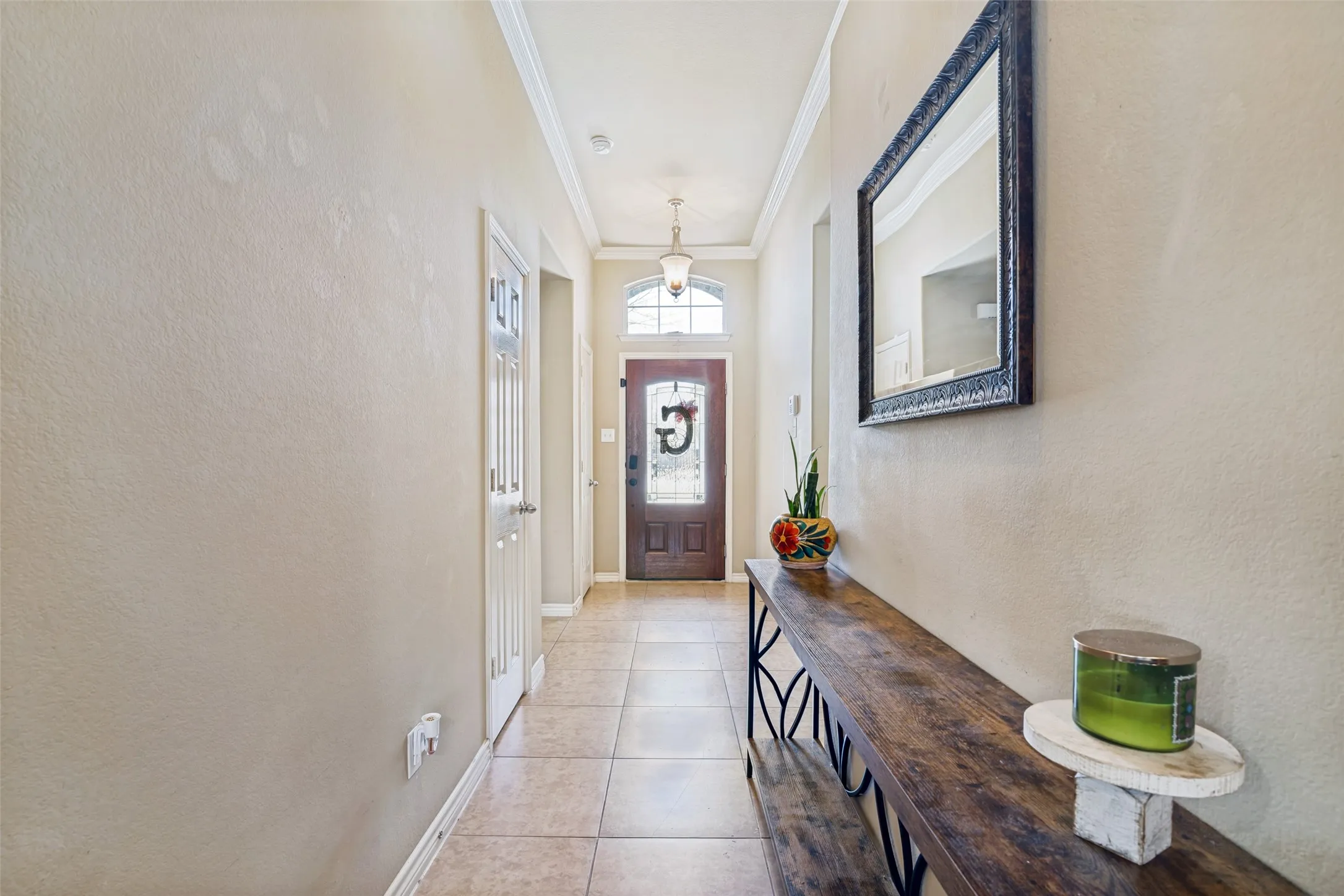 Tall ceilings welcome you home and two hall closets provide plenty of storage.