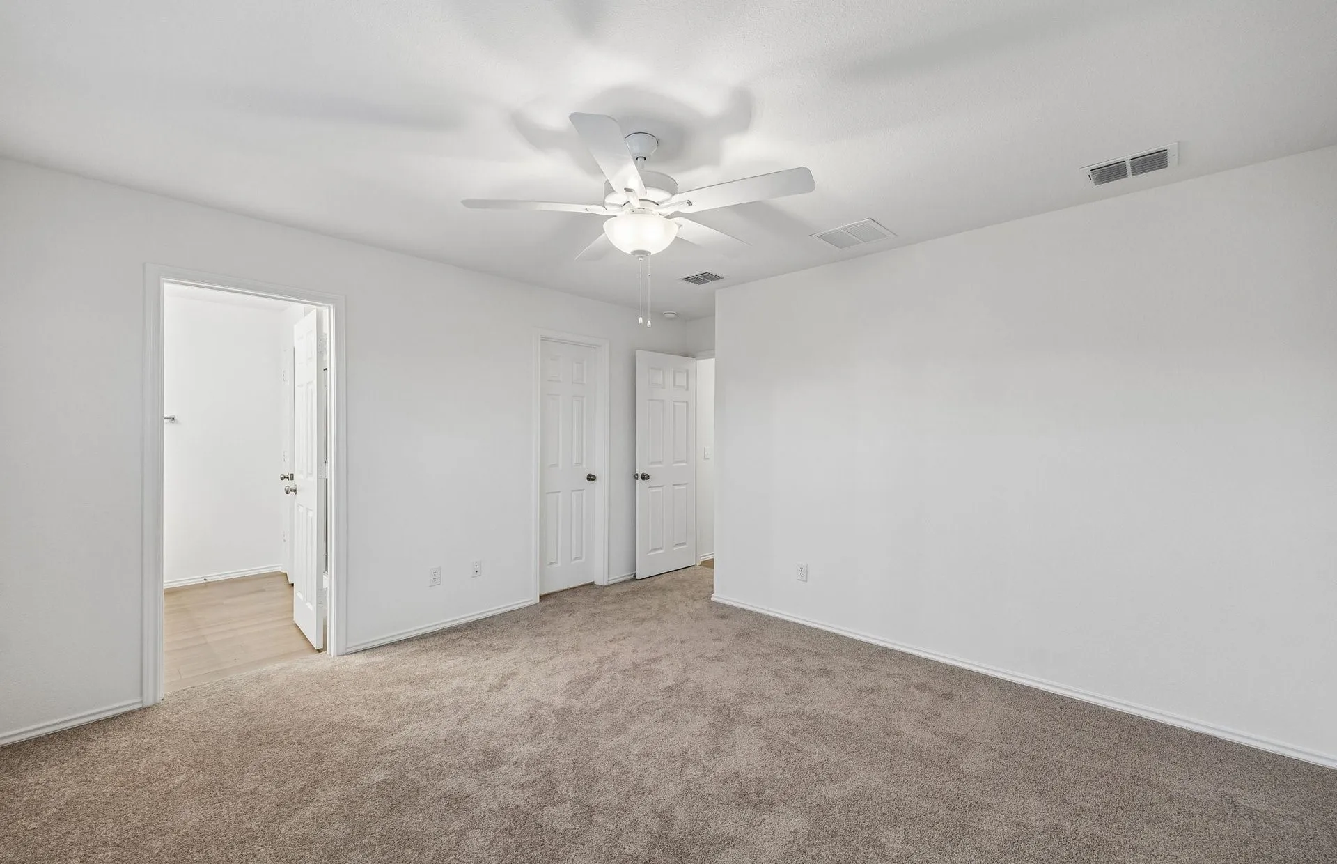 Spacious primary bedroom
