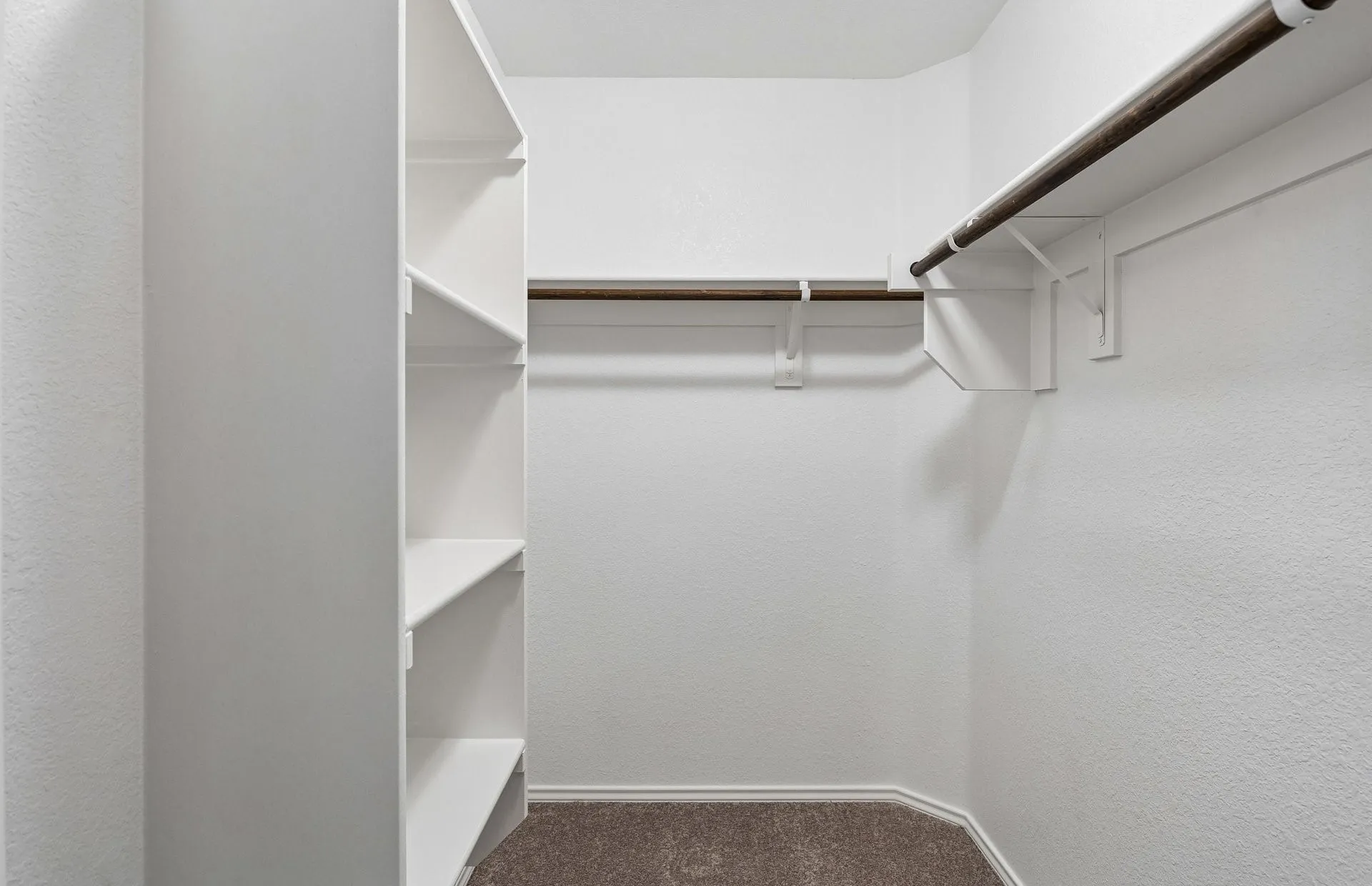 Walk-in closet in primary suite