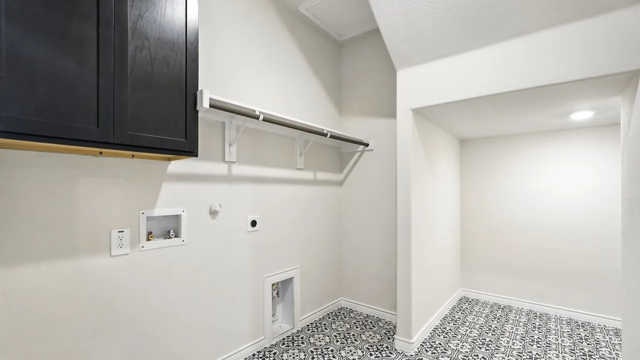 Laundry room featuring gas dryer hookup, light flooring, cabinet space, washer hookup, and hookup for an electric dryer