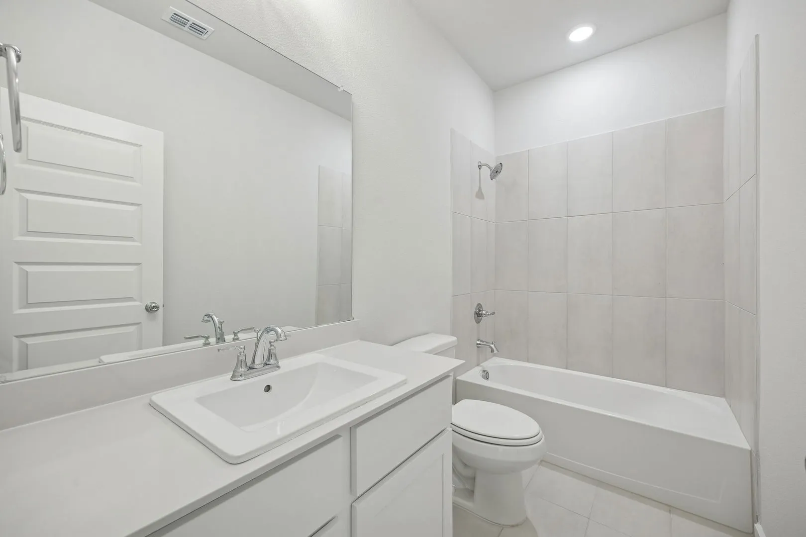 Bathroom in the Masters home plan by Trophy Signature Homes – REPRESENTATIVE PHOTO