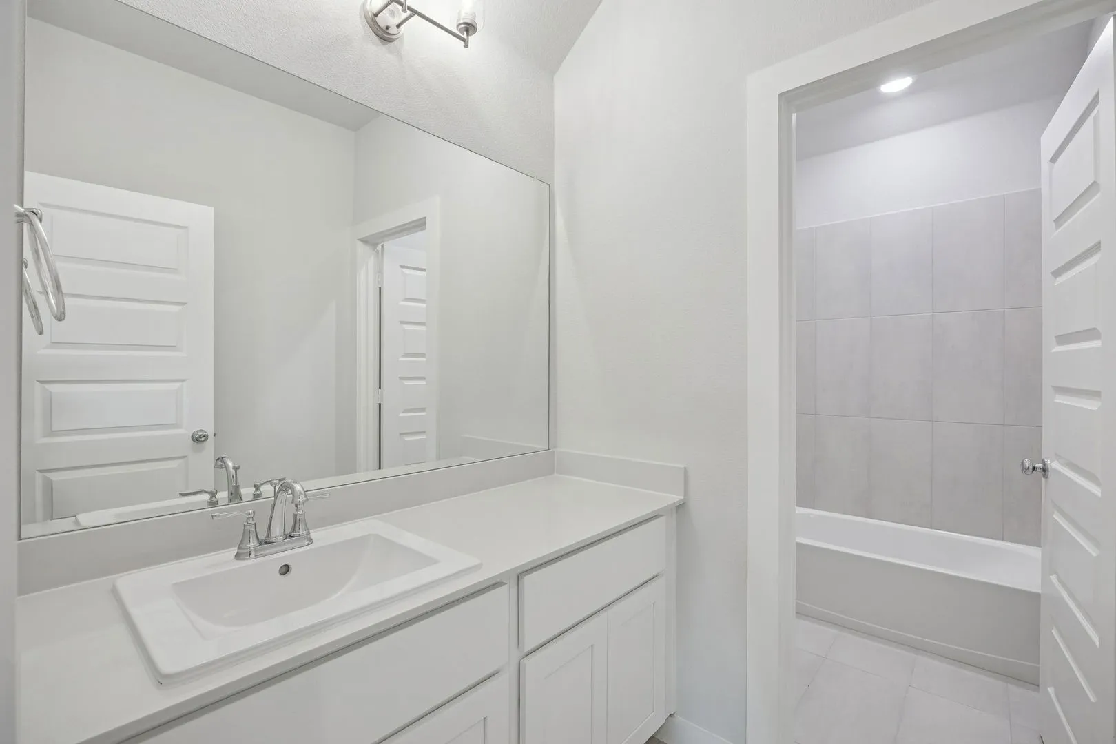 Bathroom in the Masters home plan by Trophy Signature Homes – REPRESENTATIVE PHOTO