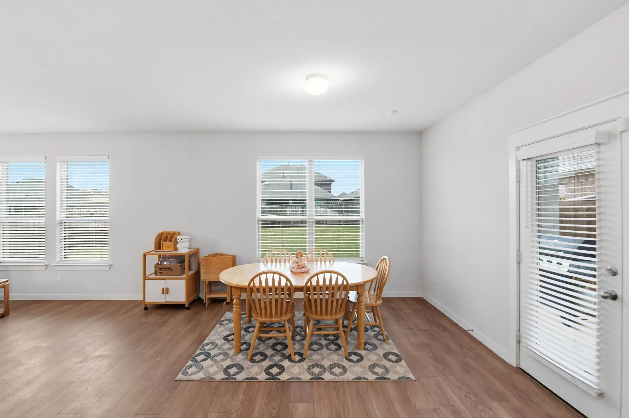 Dining space featuring light wood-type flooring