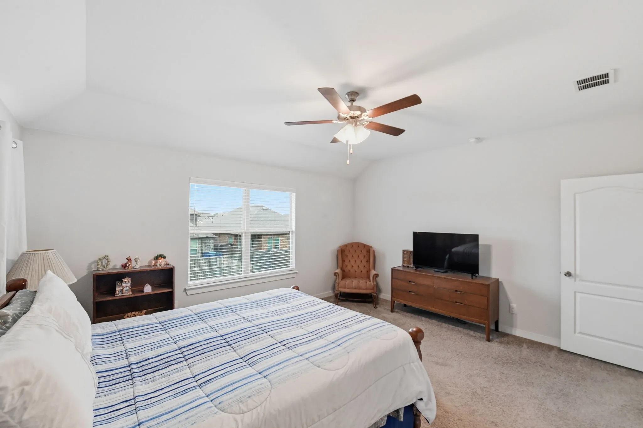 Mstr Bedroom with light carpet, a ceiling fan, and lofted ceiling