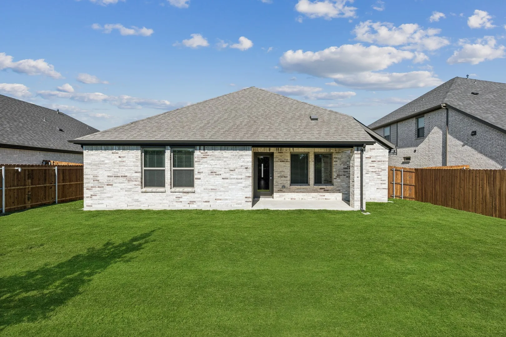 Covered Patio in the Oscar home plan by Trophy Signature Homes – REPRESENTATIVE PHOTO