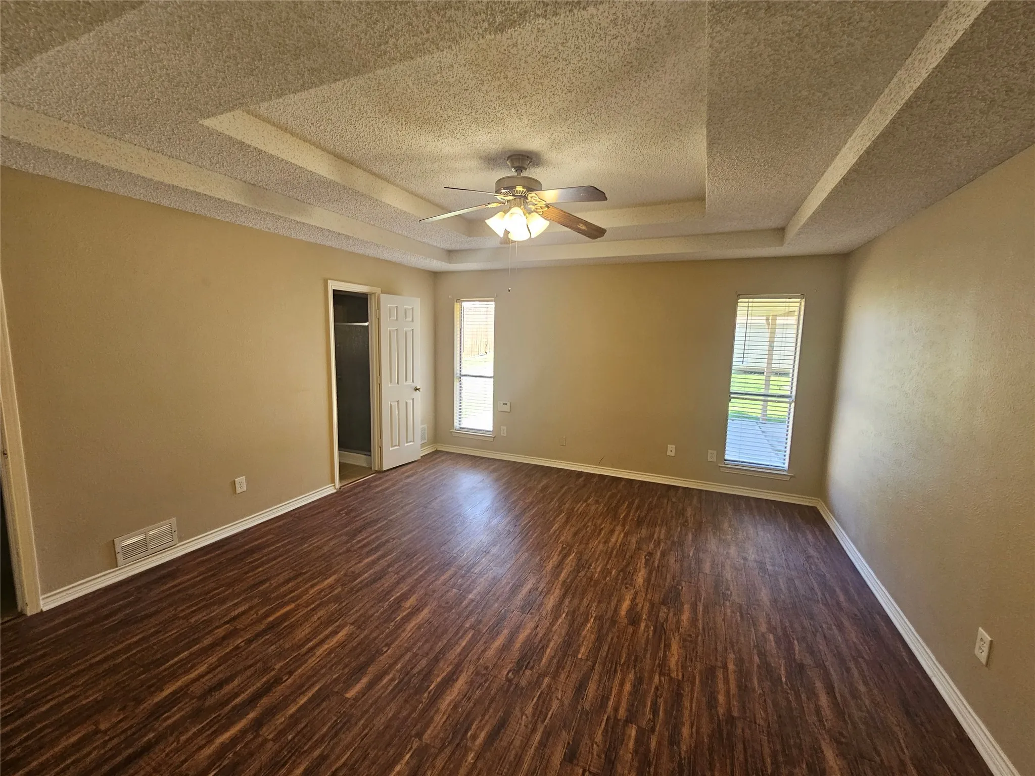 Master bedroom with back yard view