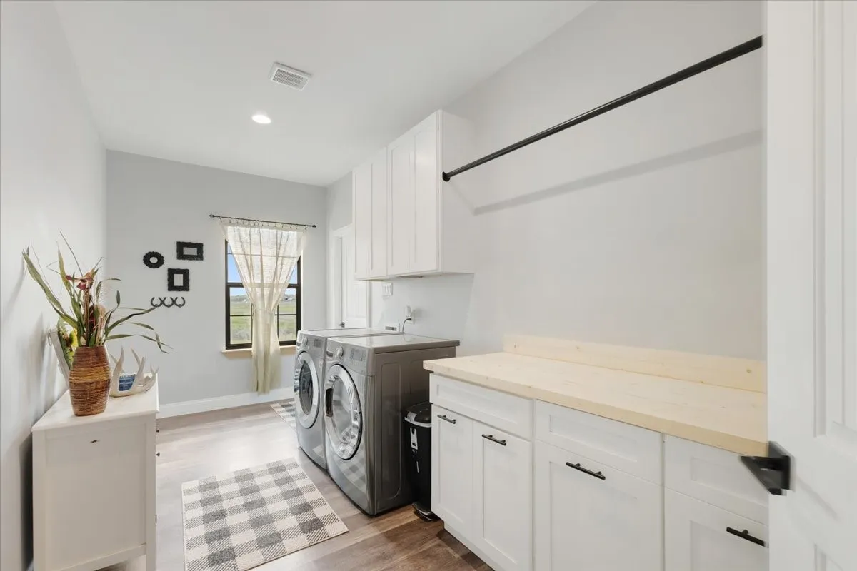 16X7.5+-SF Utility room with drip dry bar; folding area, BI cabinest; Main home