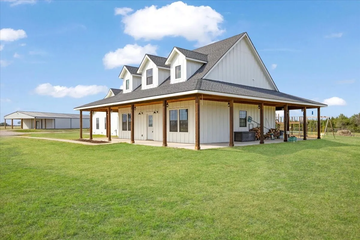 Awesome wrap porch on 3 sides of main home