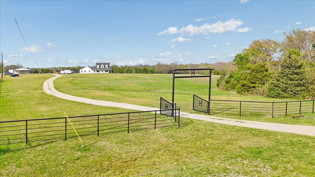 Lovely private entrance with approximately 700' driveway leading home!!!