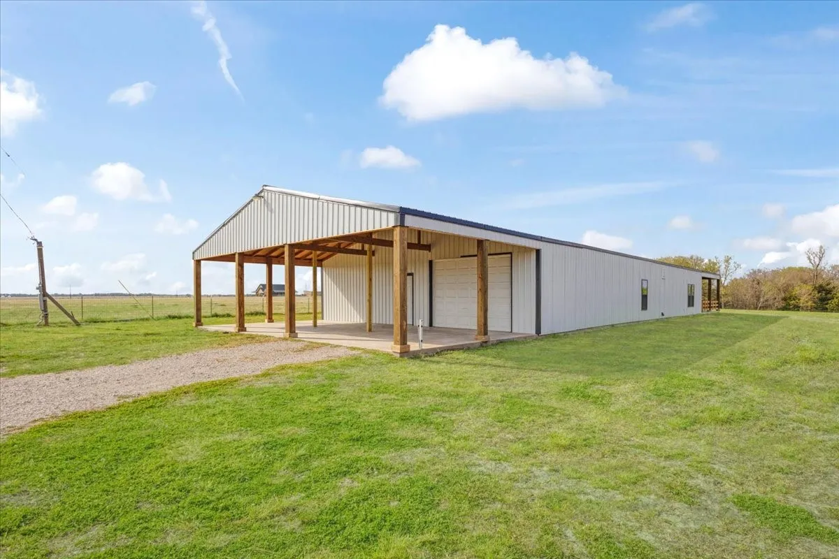40X40 Workshop with concrete and electric; 20X40 covered carport