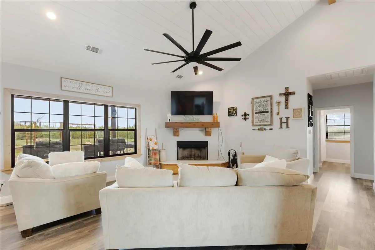 View of living room with WBFP from Breakfast Bar; Main home