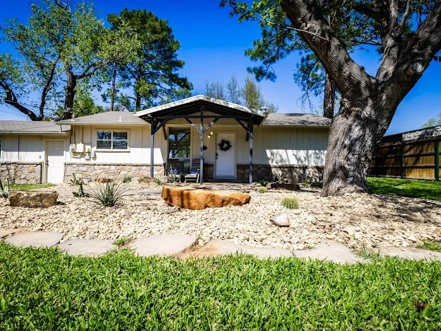 Charming Waterfront Home with Mature Shade Trees on 1.13Ac with lots of room to add on.