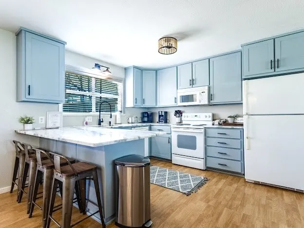 Granite Countertops and Island Bar for Extra Seating
