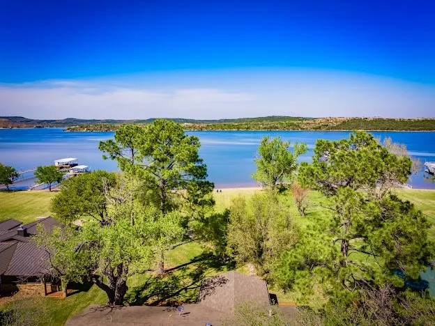 Single Family Residence For Sale in Palo Pinto County , 1957 Deer Trail Road, Possum Kingdom Lake, Texas 76449, 4 Bedroom, 2 Bathroom, 1 Garage spaces, 1,764 Sqft, built in 1960, Preowned, mls#21215986, Real Estate Agent in Possum Kingdom Lake, Homes For Sale in Palo Pinto county, Homes For Sale in Possum Kingdom Lake, Realtor in Possum Kingdom Lake Texas, Real Estate Brokerage Independent Realty Texas, Luminita Cordes Realtor