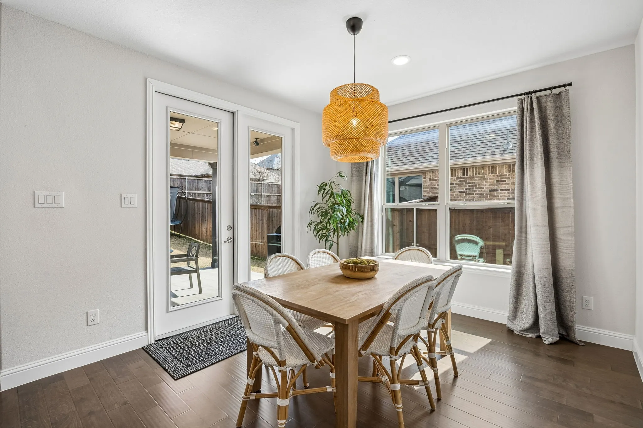 Dining area featuring dark wood finished floors
