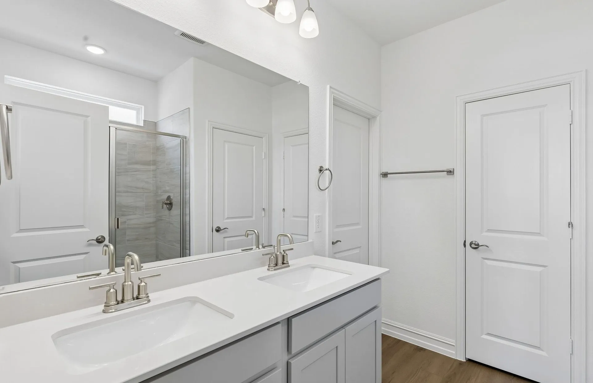 Owners private bath with double vanity