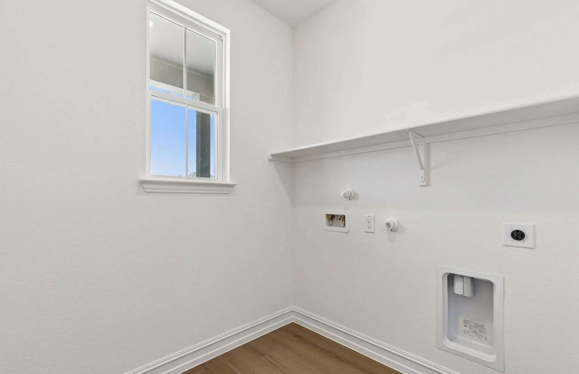 Laundry room with built in shelving