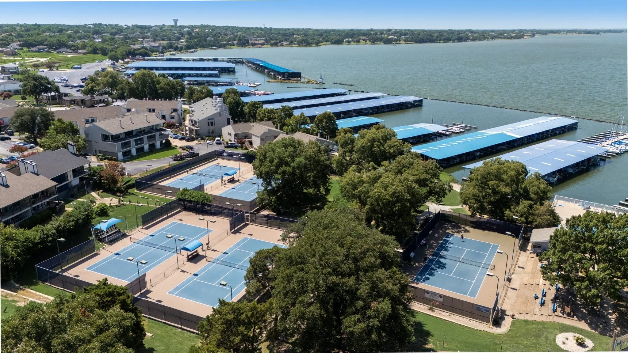 Community tennis courts and marina