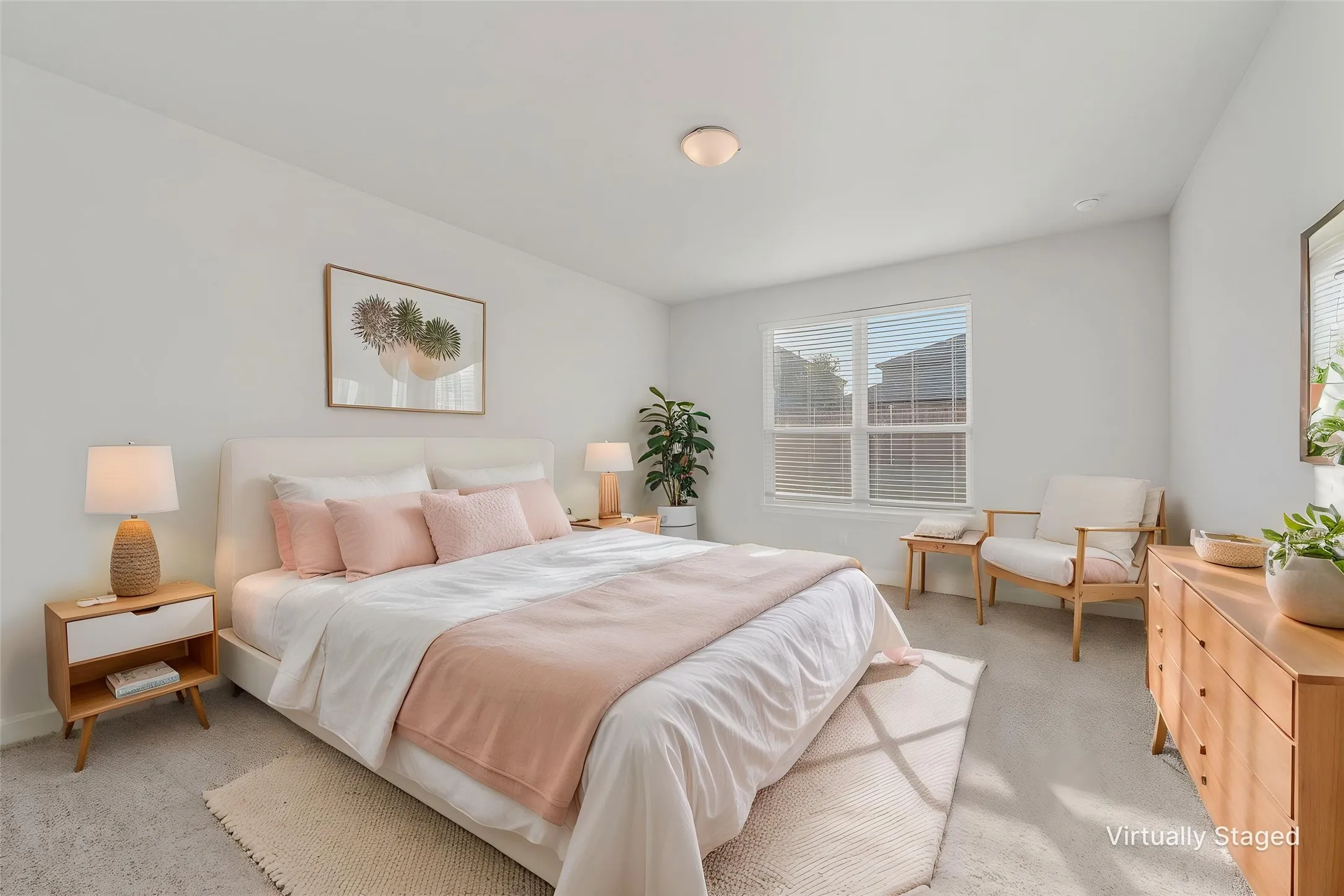 Wall-to-wall carpeting and neutral wall finishes create a bright atmosphere, complemented by a large window with privacy blinds and a ceiling-mounted light​​‌​​​​‌​​‌‌​‌‌​​​‌‌​‌​‌​‌​​​‌​​ fixture