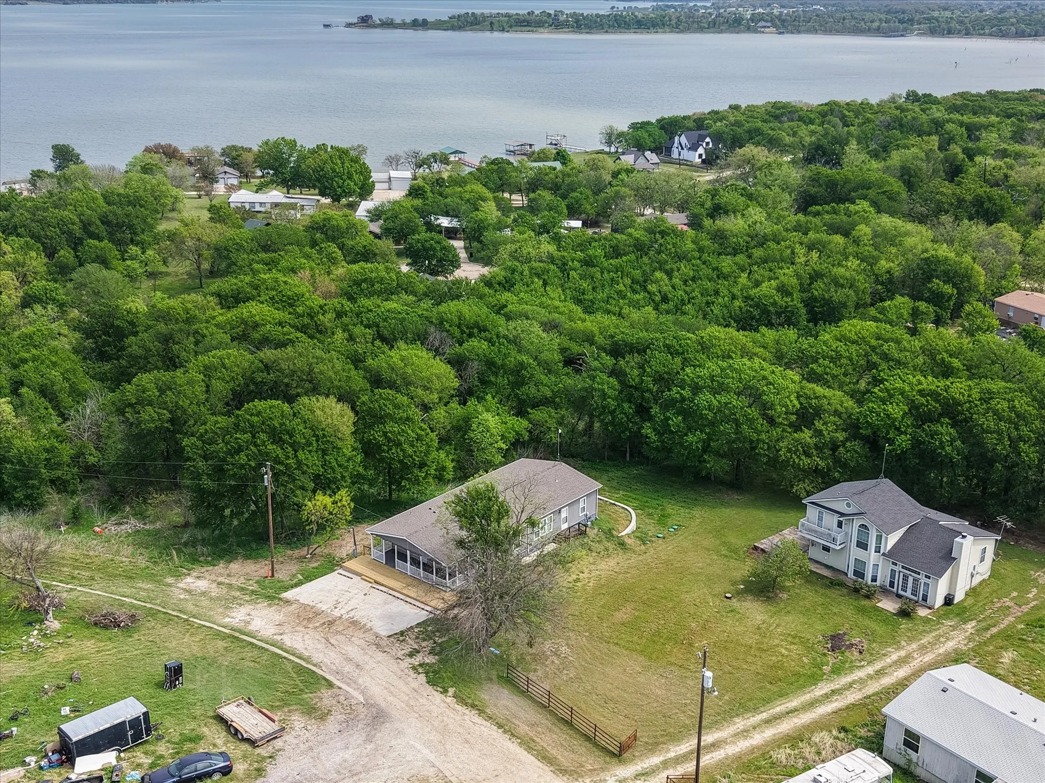 Beautiful aerial view captures nearby Richland Chambers Lake and the peaceful wooded surroundings of Sunrise Point.