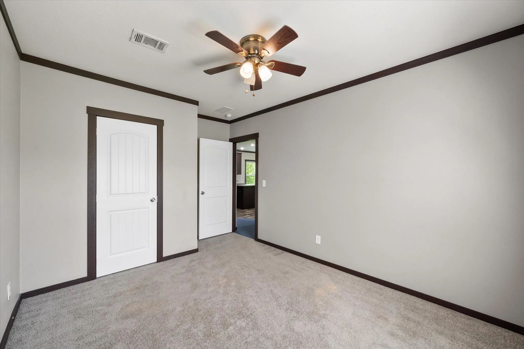 Versatile third bedroom works beautifully as a guest room, office, nursery, or hobby space near Richland Chambers Lake.