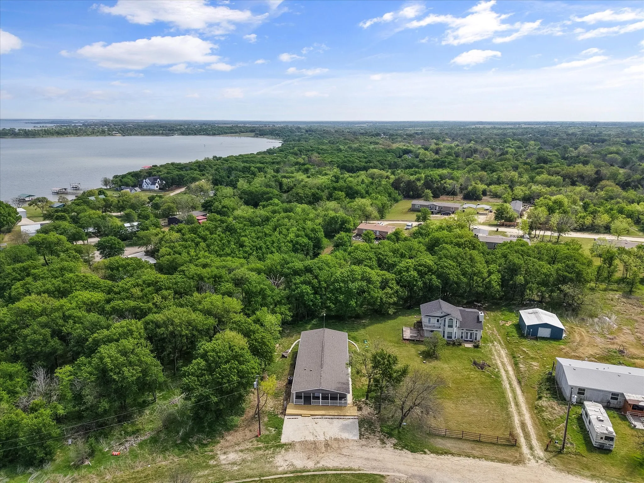 Aerial perspective showcases the home’s proximity to Richland Chambers Lake and the natural beauty surrounding Sunrise Point.