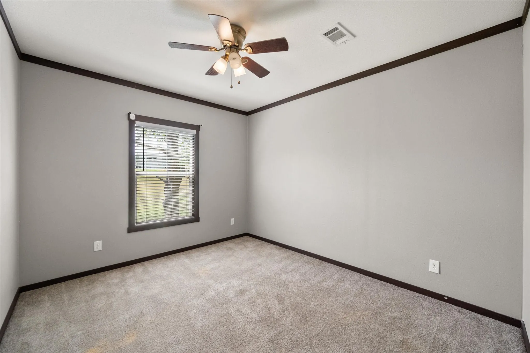 Inviting guest bedroom offers comfortable accommodations for visitors, first-time buyers, or investment rental opportunities.