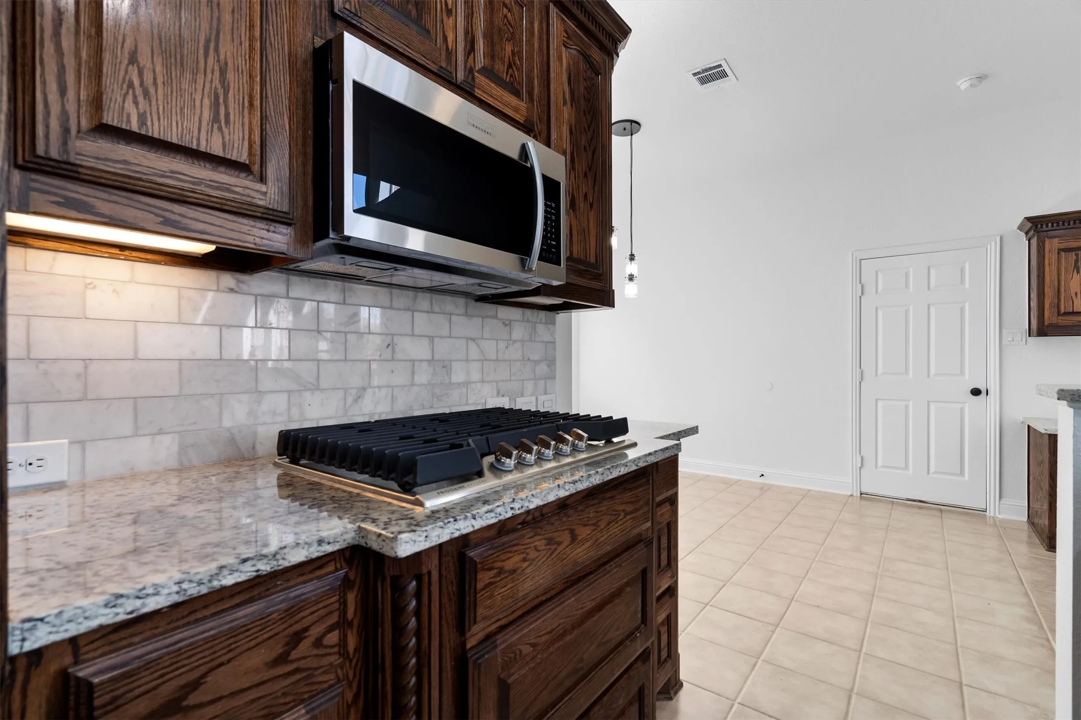 Brand new five burner gas cooktop and microwave