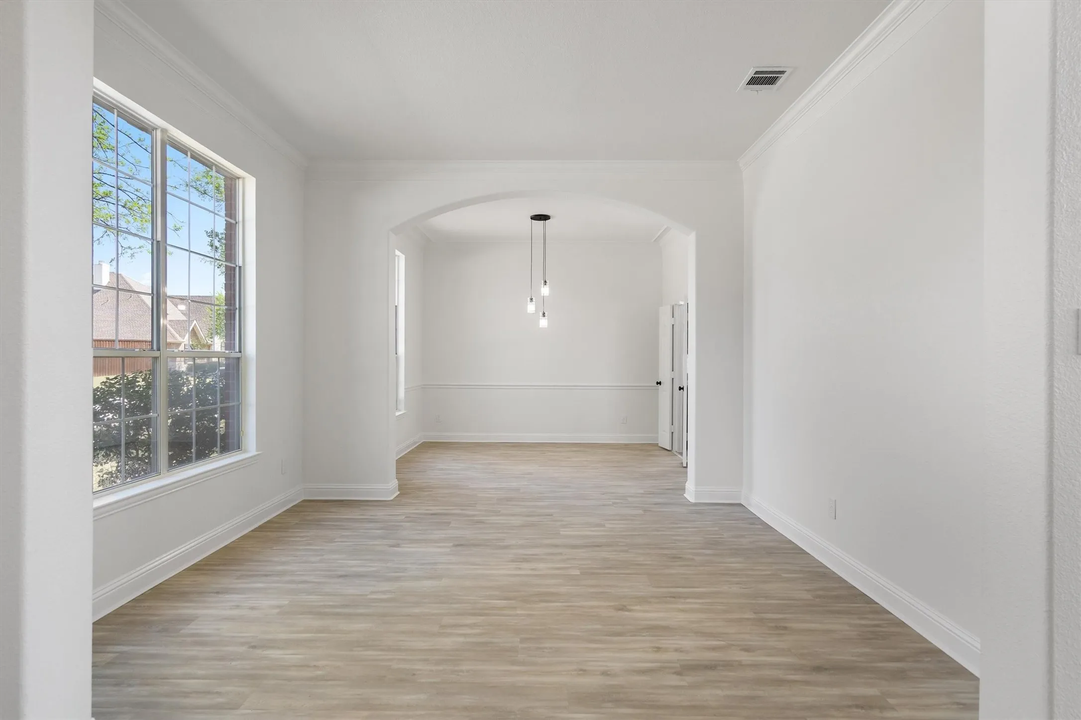 Formal living and dining spaces located at the front of the home