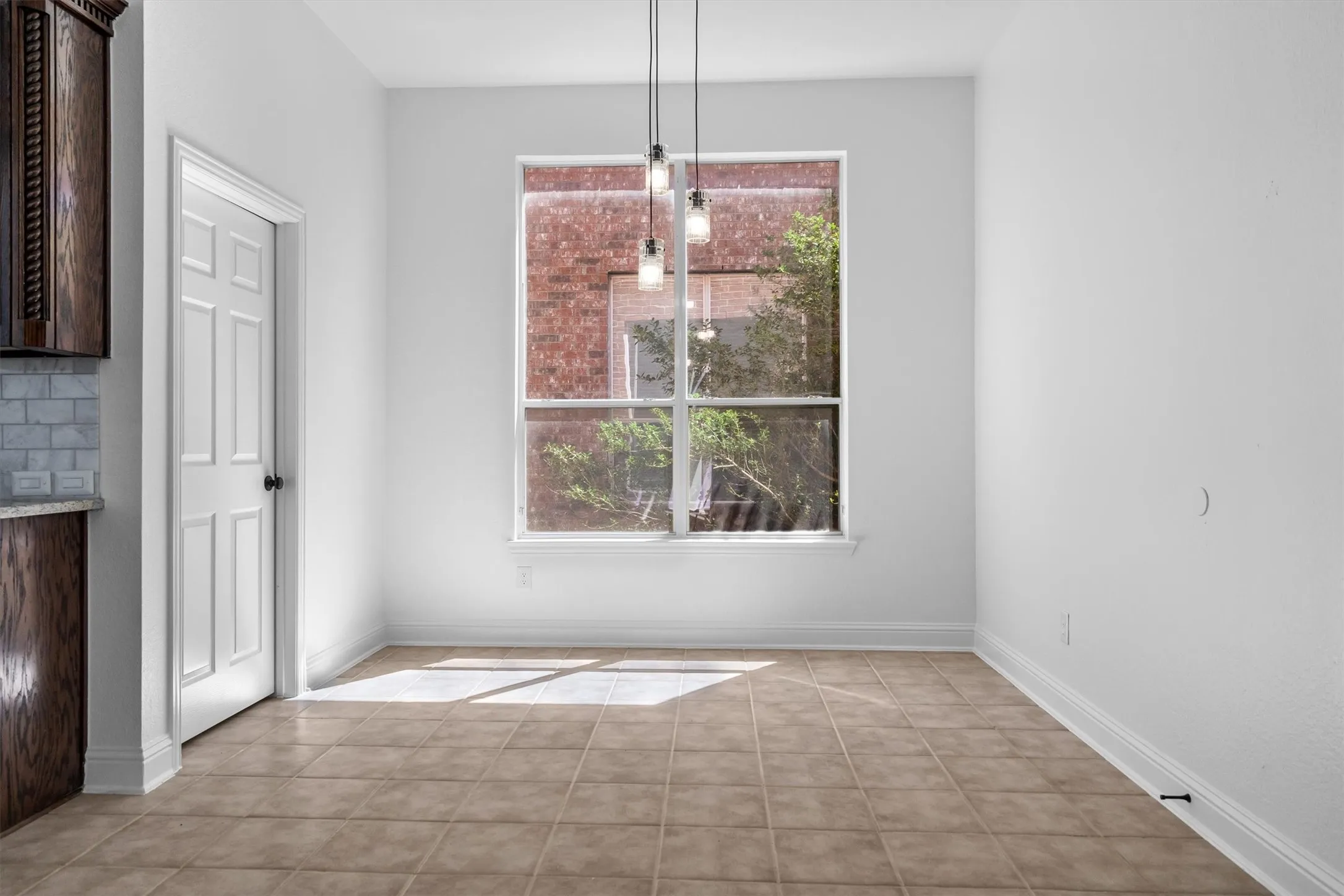 Breakfast area with laundry room to the left
