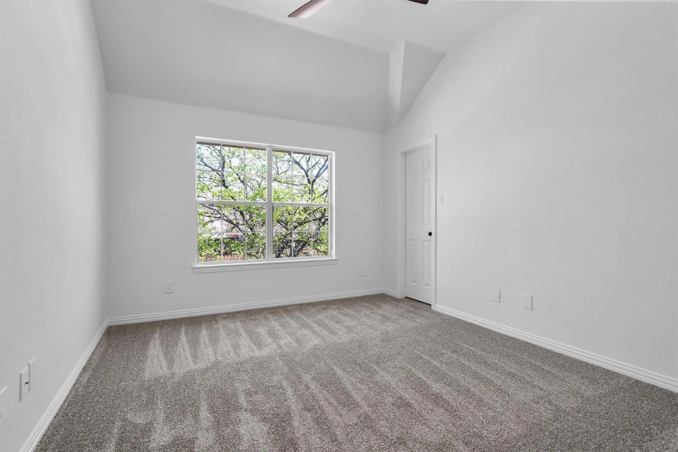 One of three secondary bedrooms, all located on the second floor