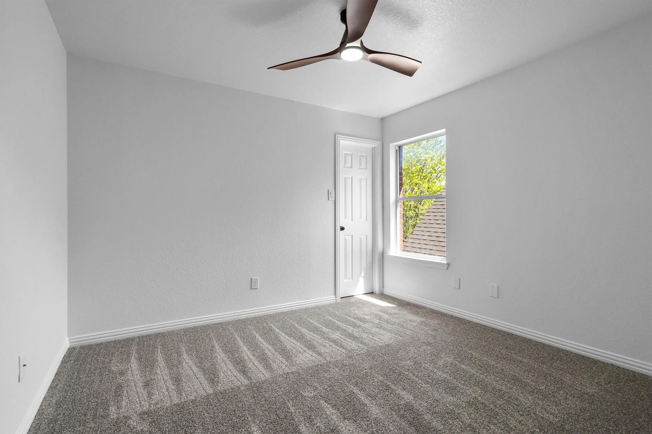 One of three secondary bedrooms, all located on the second floor