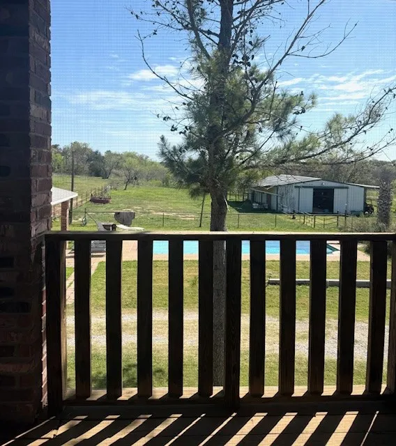 PRIMARY BDRM BALCONY FACING POOL