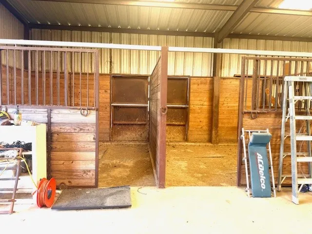 TWO STALLS, ROOM FOR 2 MORE, DRIVE THRU DOORS