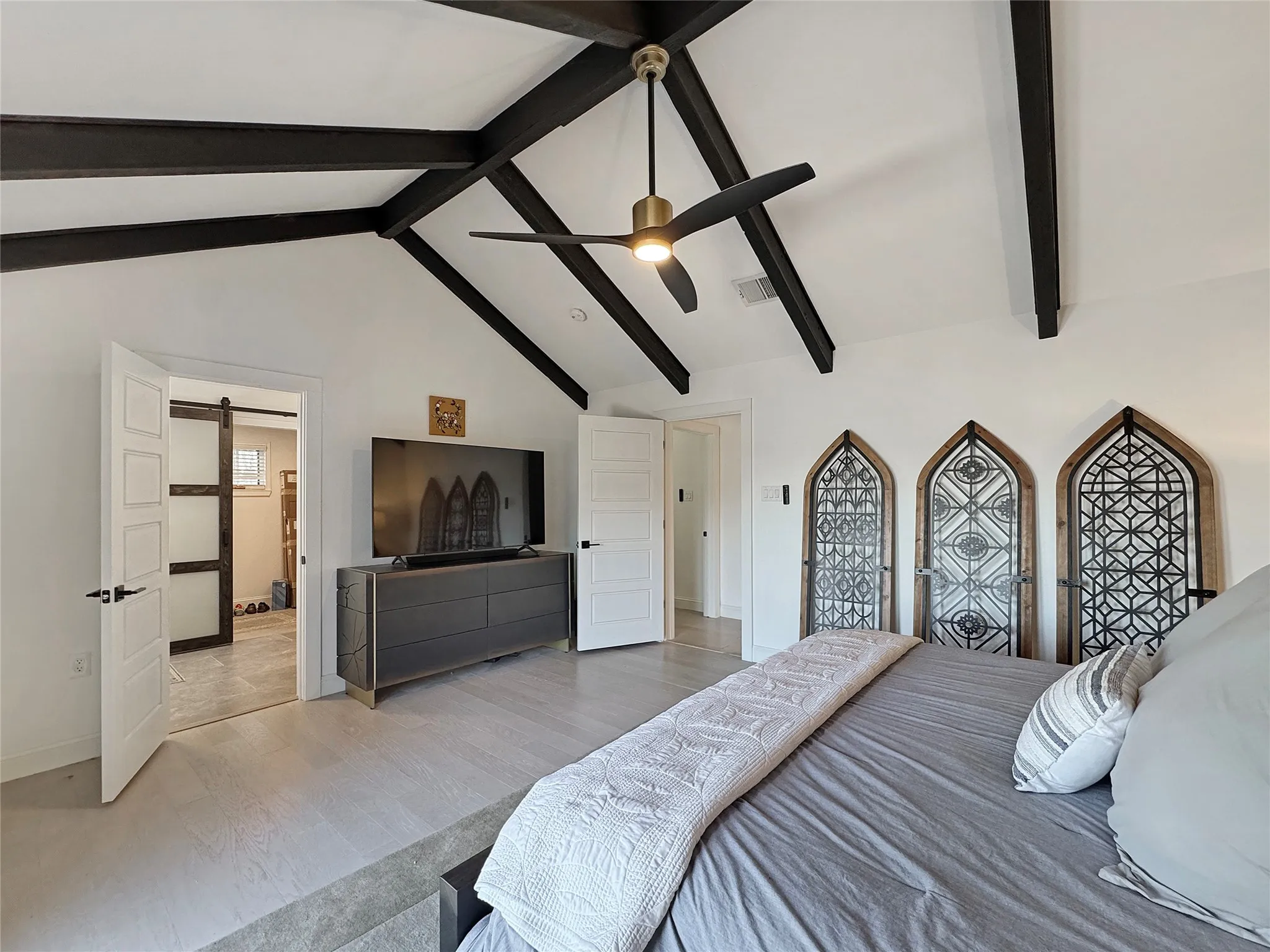 Gorgeous beams accent the ceiling