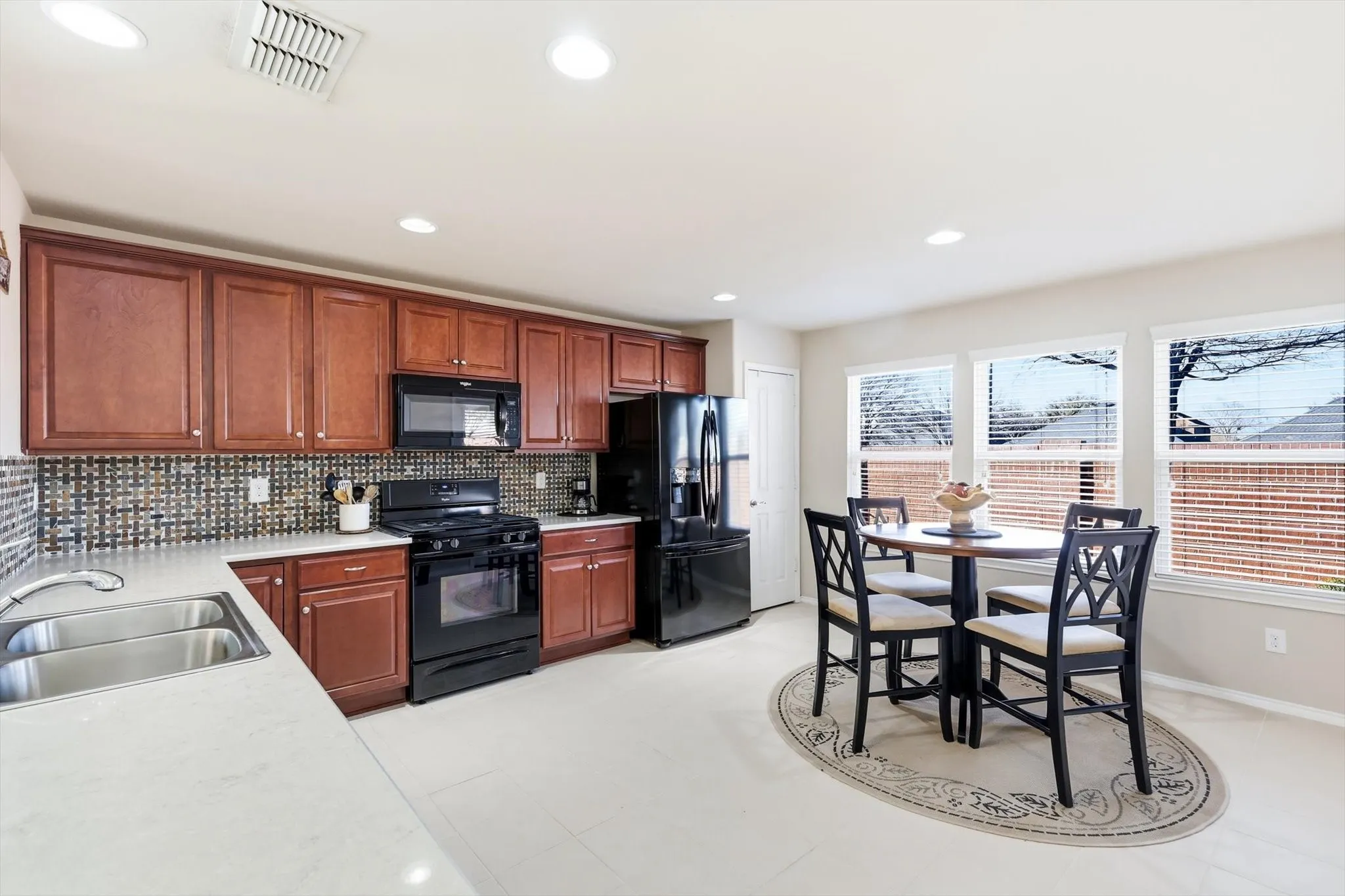 Kitchen has a cozy Breakfast Area