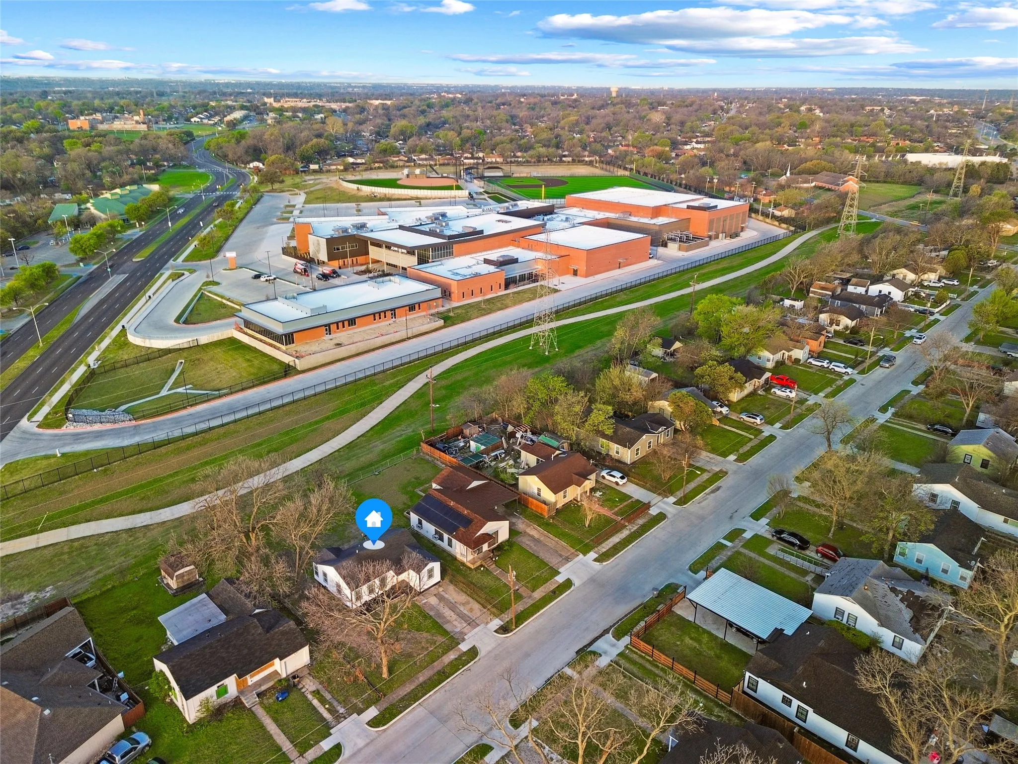View of property location featuring nearby suburban area