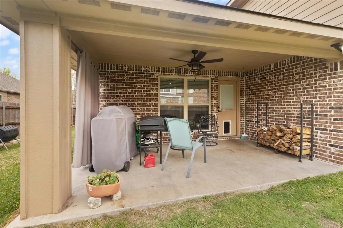 View of patio / terrace featuring ceiling fan and area for grilling