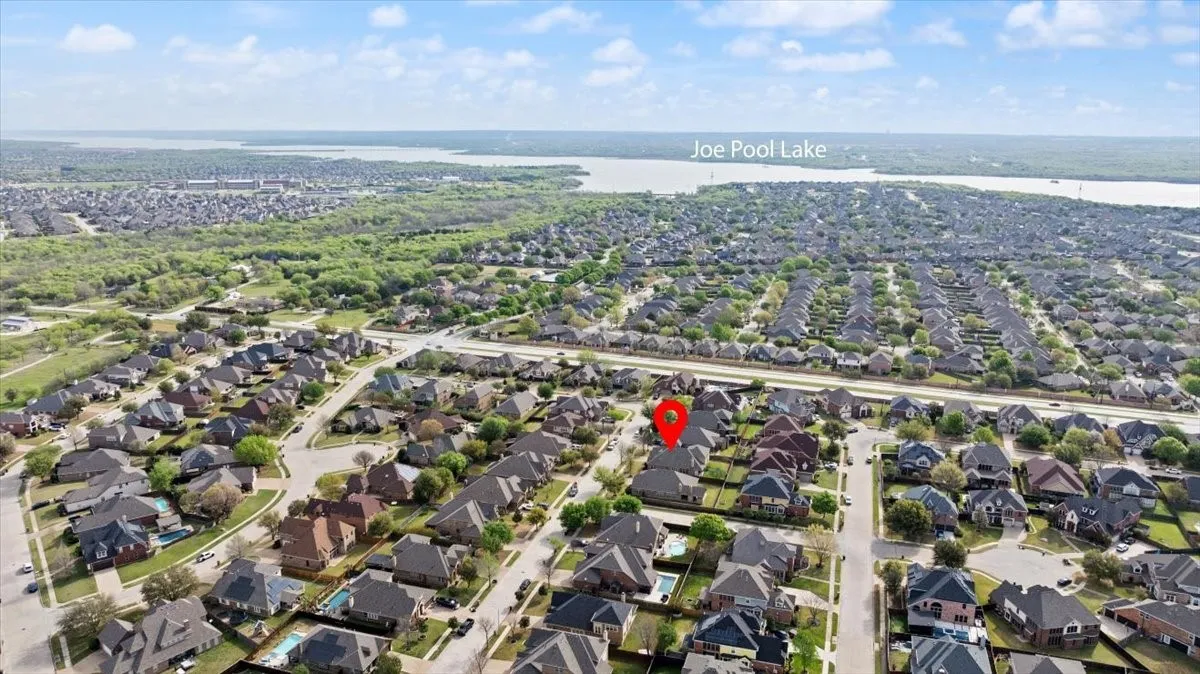 Aerial view of residential area with a nearby body of water