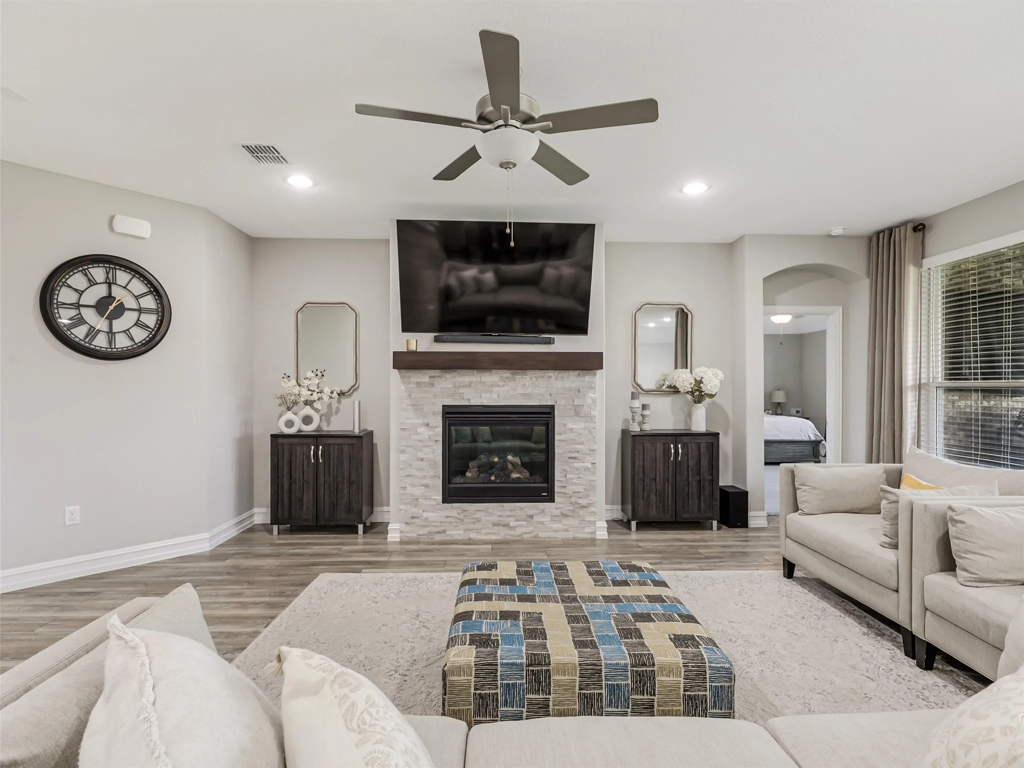 Large Open Living with Beautiful and Durable Laminate Flooring.