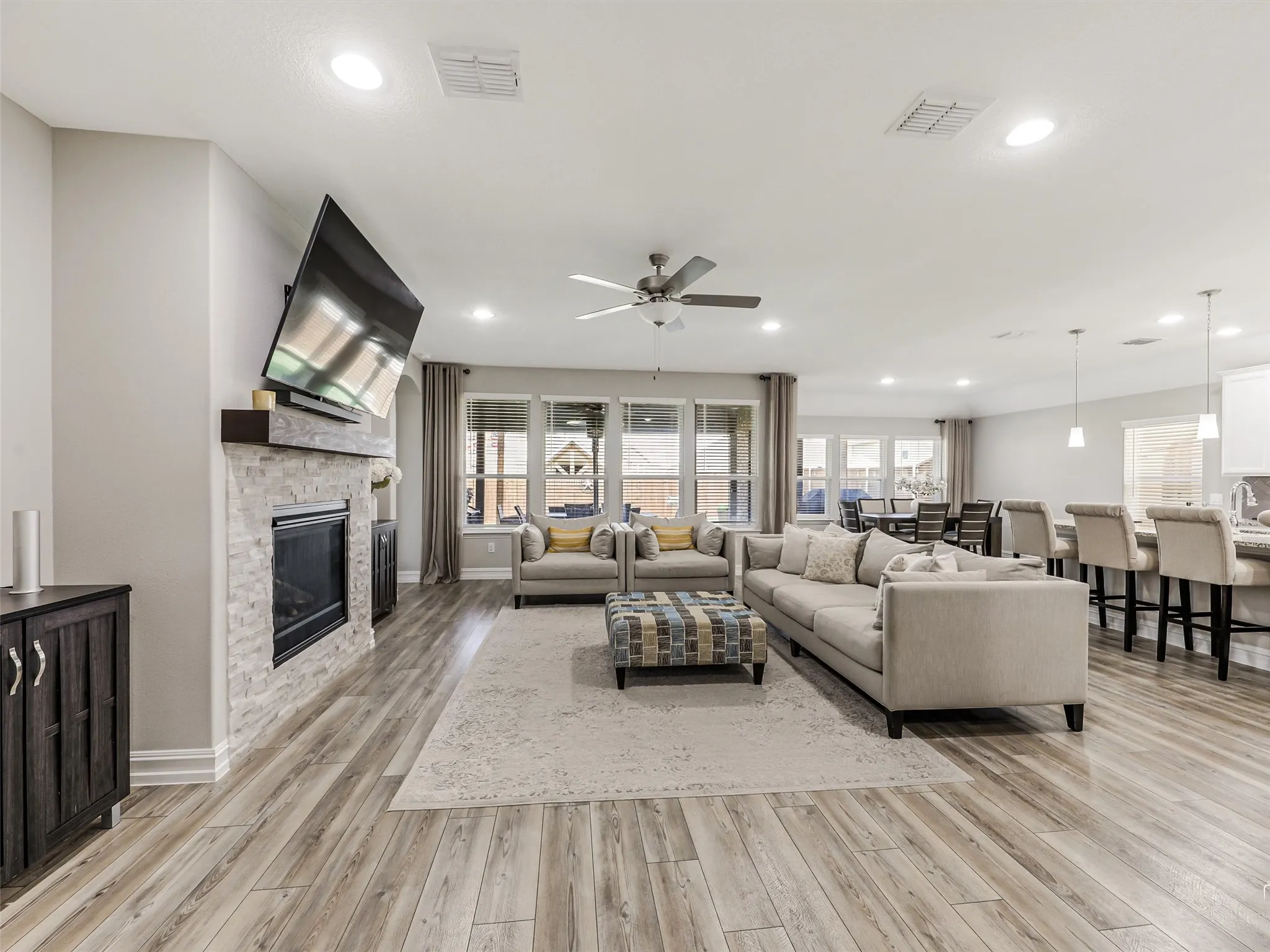 Wonderful View out the Large Windows to the Large Patio and Fully Turfed Backyard.