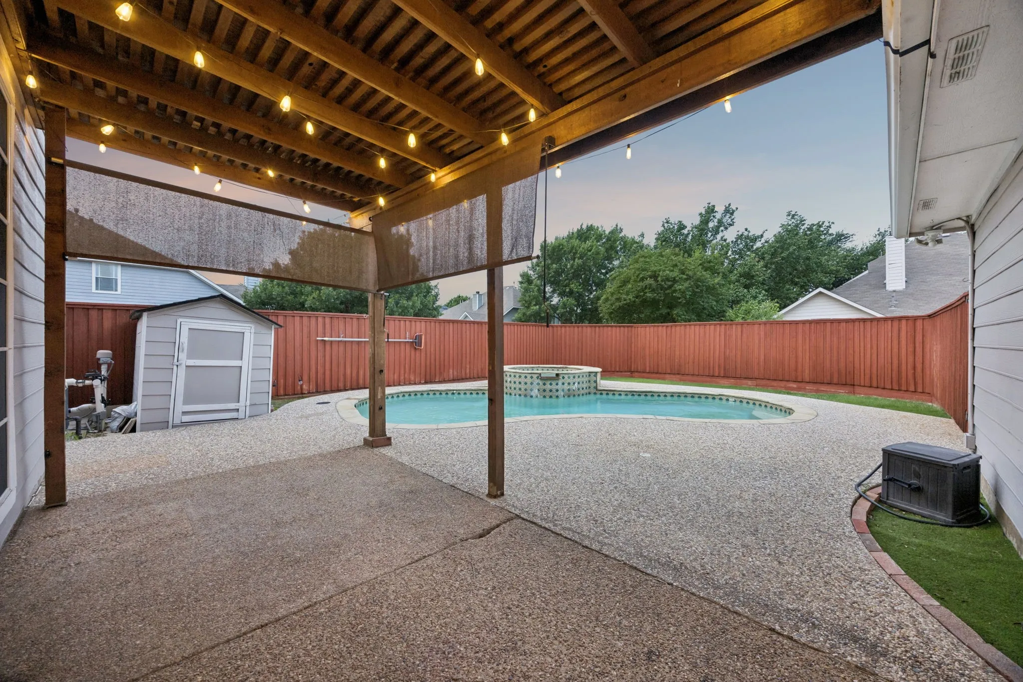 Two-story brick exterior with a gabled roofline
