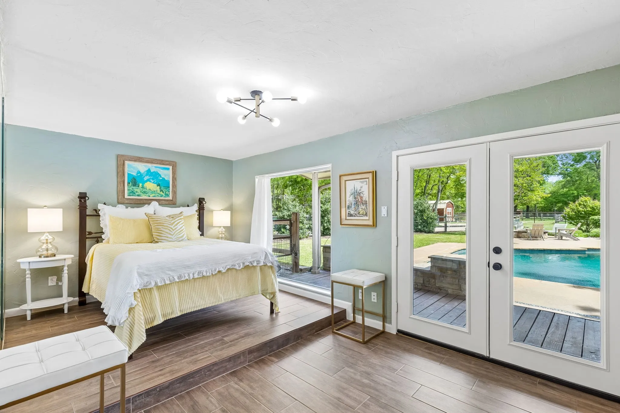 Bedroom 4 with amazing wall of windows with private entrance to the pool
