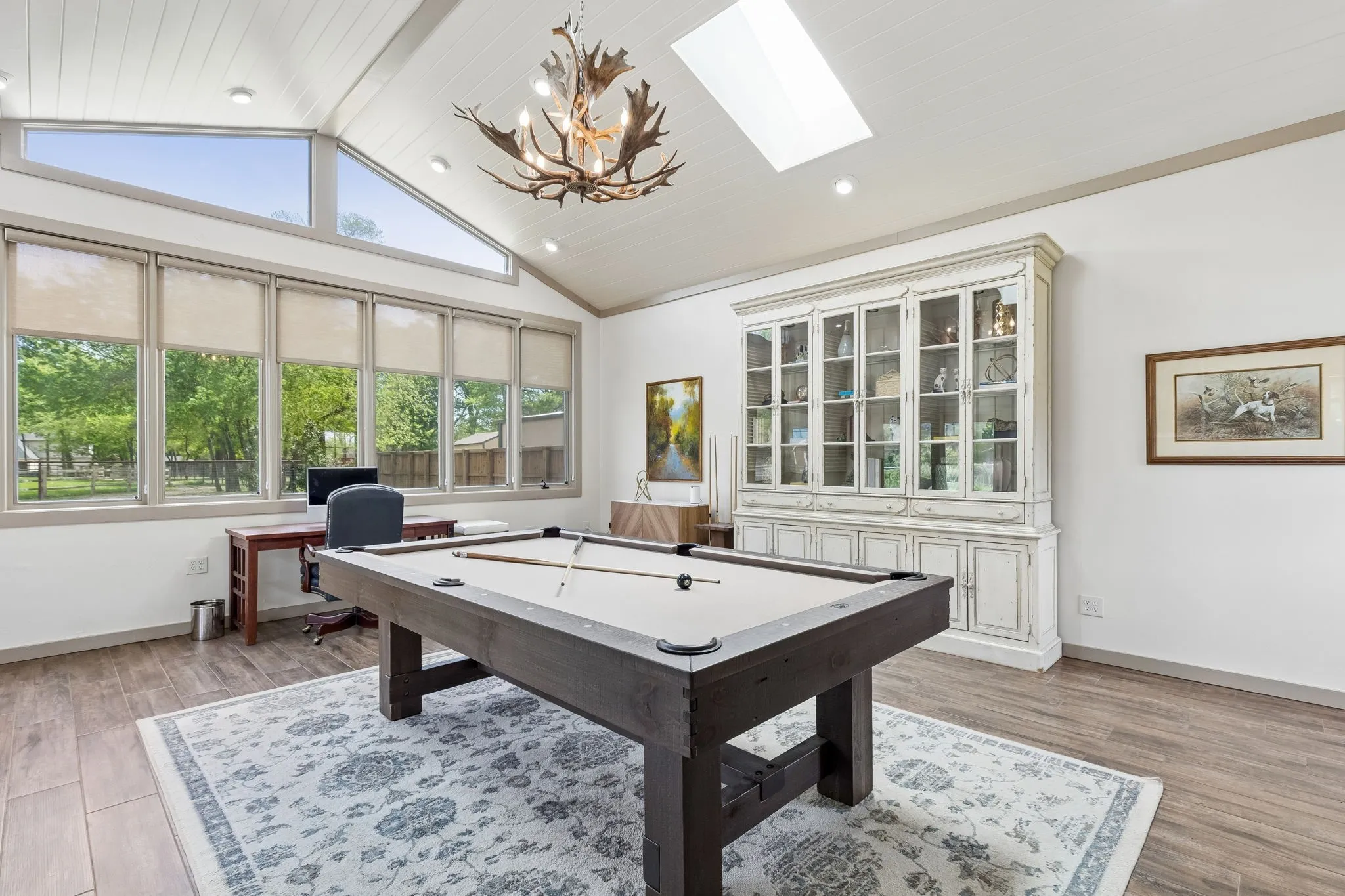 Beautifully updated game room with custom lighting , multiple skylights.   Game room also can double as an oversized office space