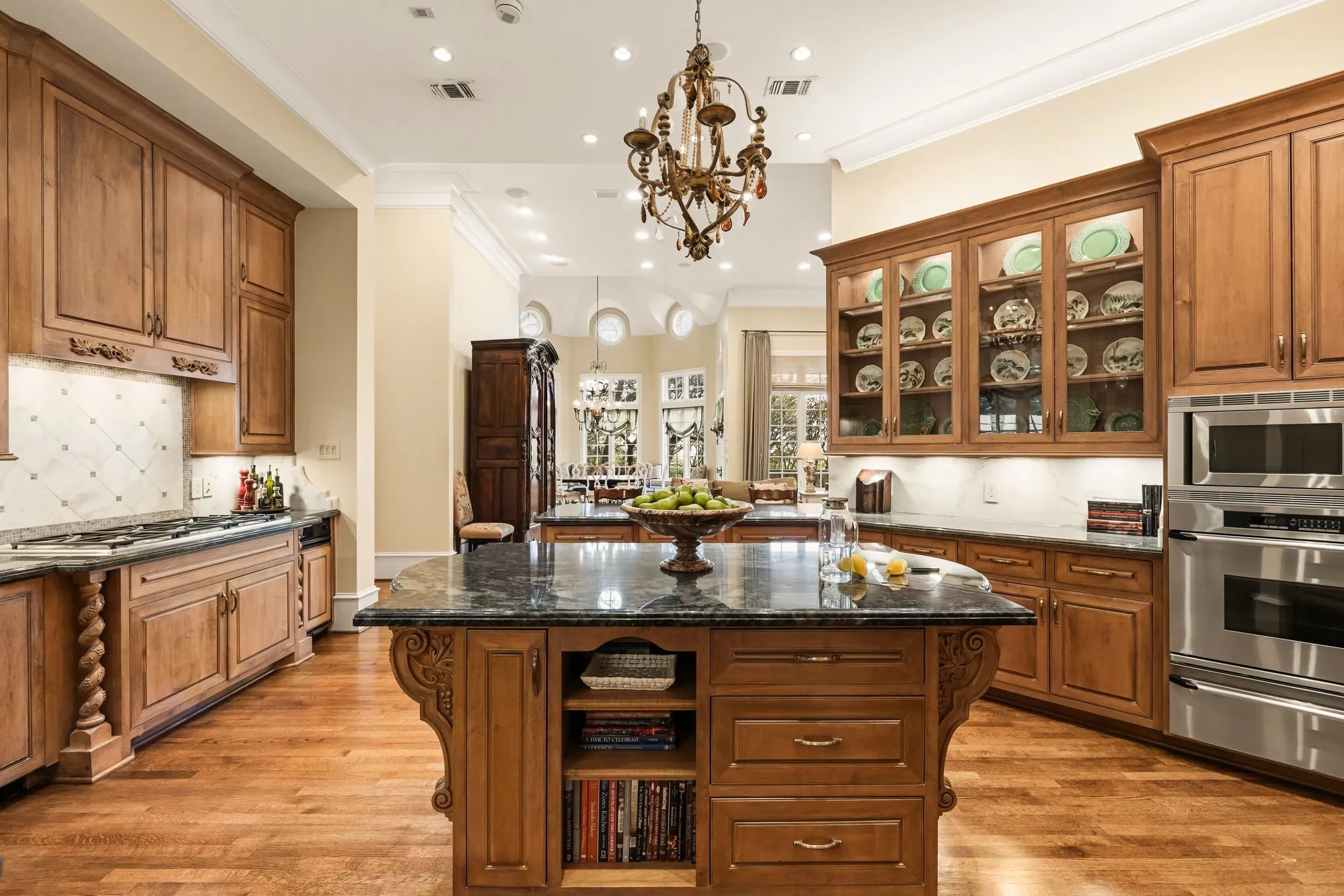 Custom woodwork throughout kitchen with dual dishwashers