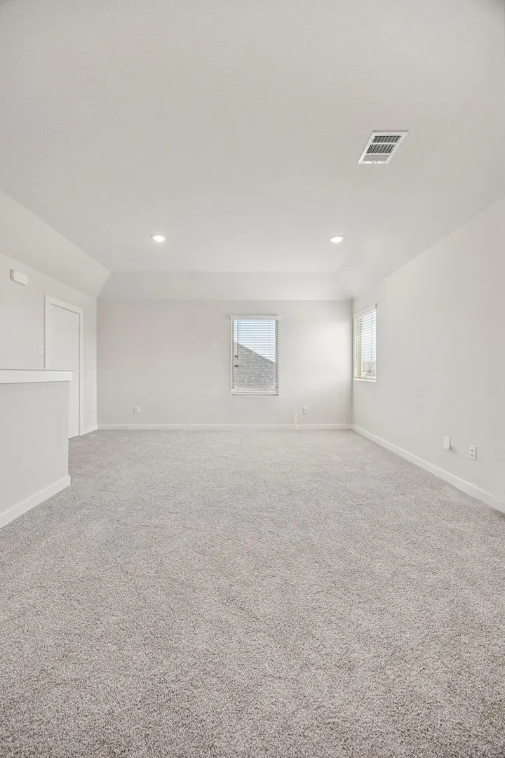 Game Room in the Stanley II home plan by Trophy Signature Homes – REPRESENTATIVE PHOTO