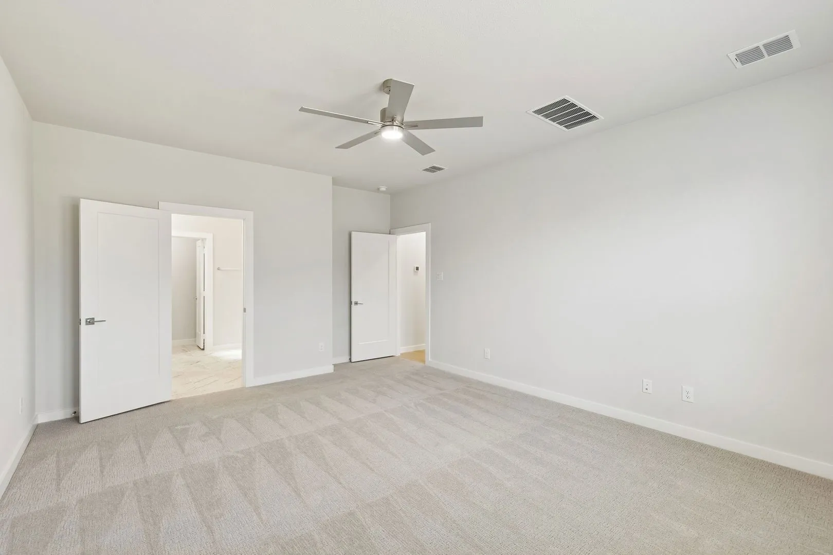 Primary Suite in the Masters home plan by Trophy Signature Homes – REPRESENTATIVE PHOTO