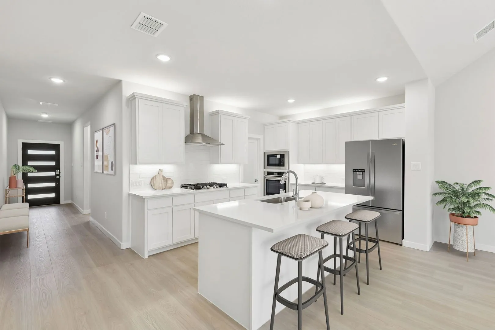 Kitchen in the Masters home plan by Trophy Signature Homes – REPRESENTATIVE PHOTO